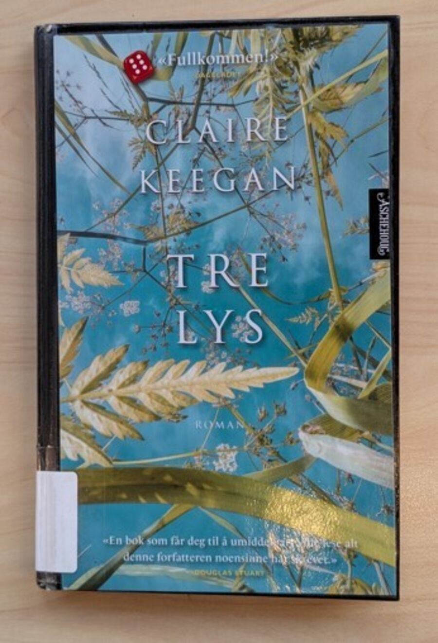 Omslag til boken tre lys